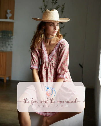 THE FOX AND THE MERMAID