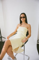 Wildflo Studio Ribbed Tube Dress or Midi Skirt in Butter at Style Society Marketplace studio picutre sitting down 